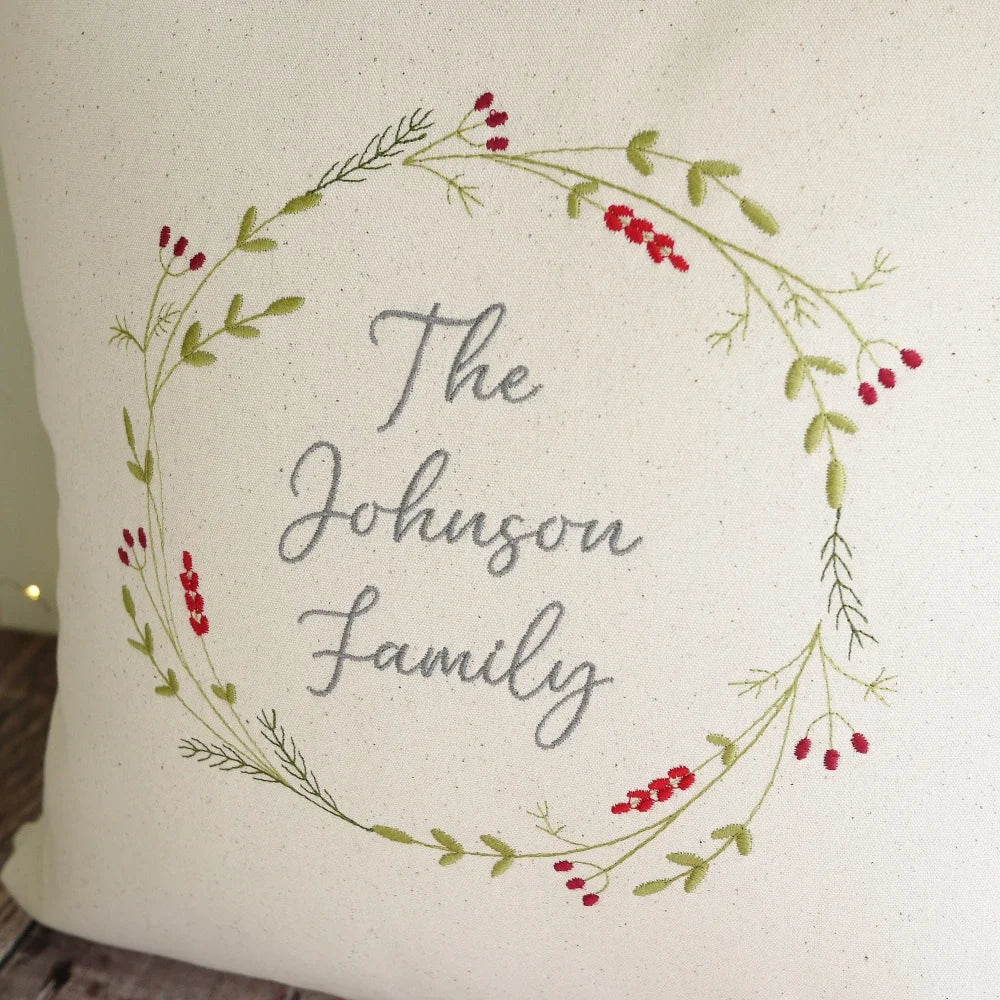Personalised Family Christmas Embroidered Cushion with Festive Wreath