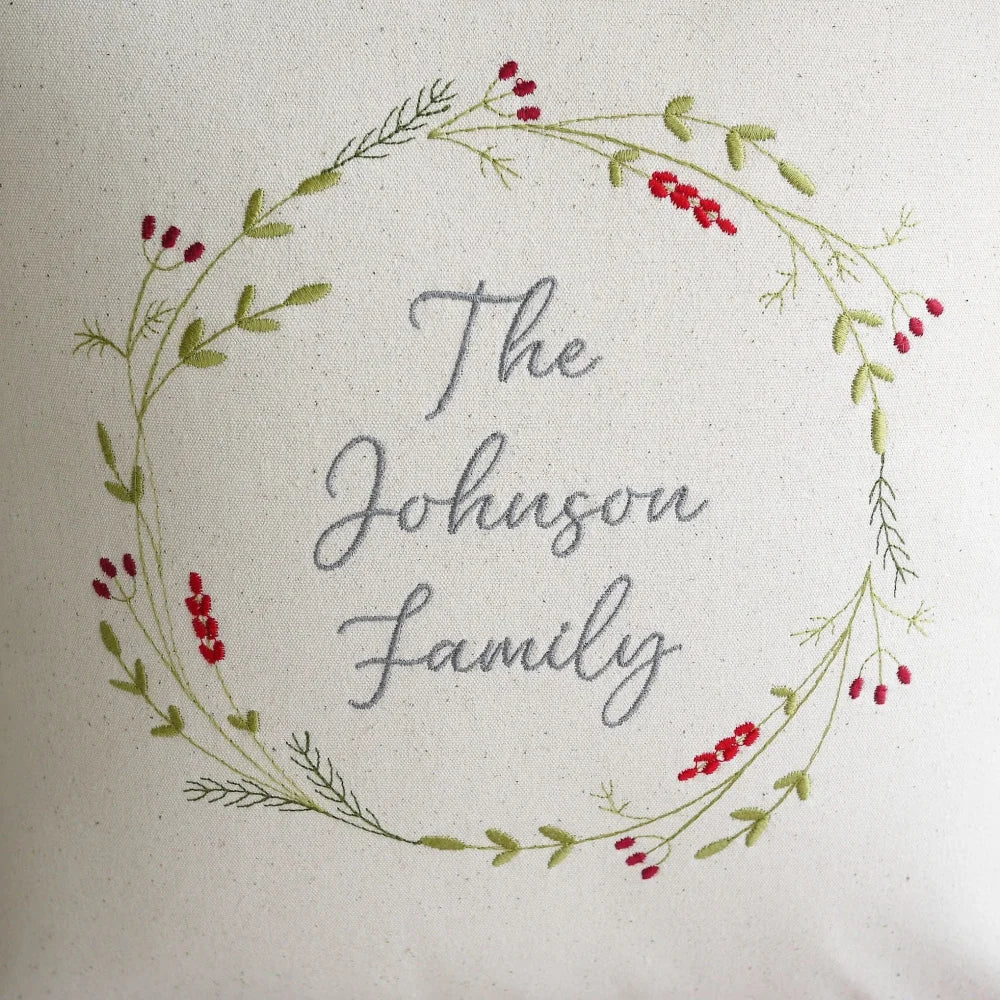 Personalised Family Christmas Embroidered Cushion with Festive Wreath