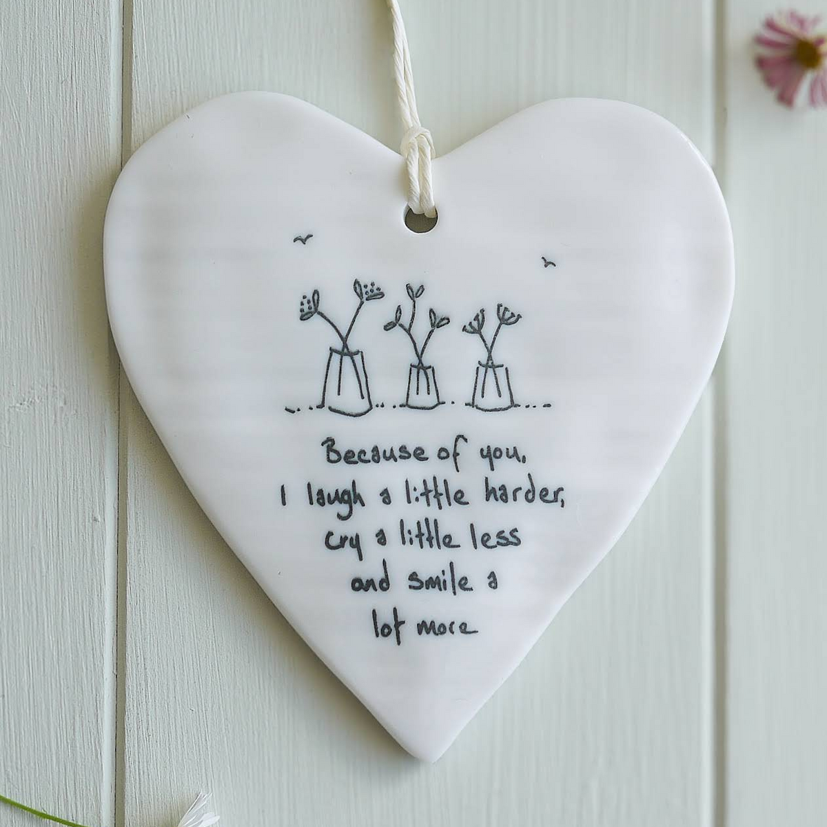 Porcelain heart-shaped decoration ’Because of you I laugh a little harder...’