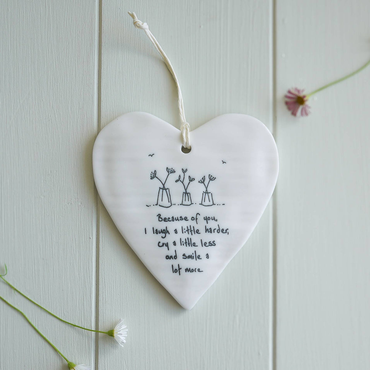Porcelain heart-shaped decoration ’Because of you I laugh a little harder...’