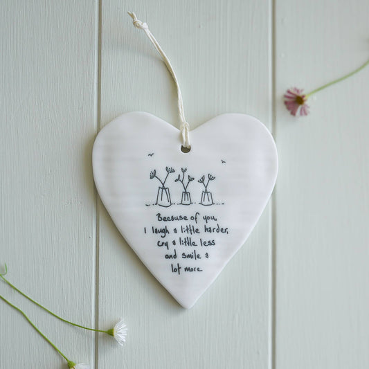 Porcelain heart-shaped decoration ’Because of you I laugh a little harder...’